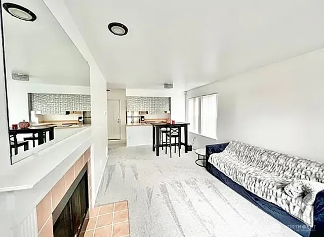 a kitchen with a refrigerator sink and stove