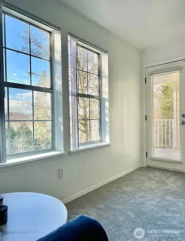 a bathroom with a sink toilet a mirror and vanity
