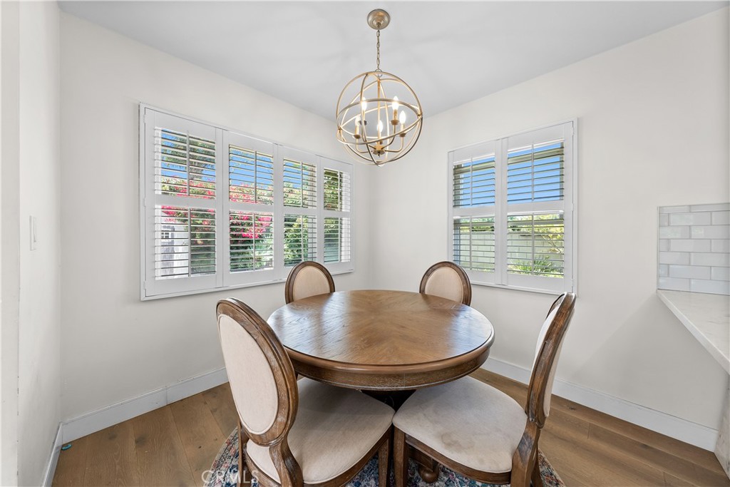 2053 Middlebrook Road Torrance, CA 90501 - Photo 13 of 45 a view of a dining room with furniture window and wooden floor
