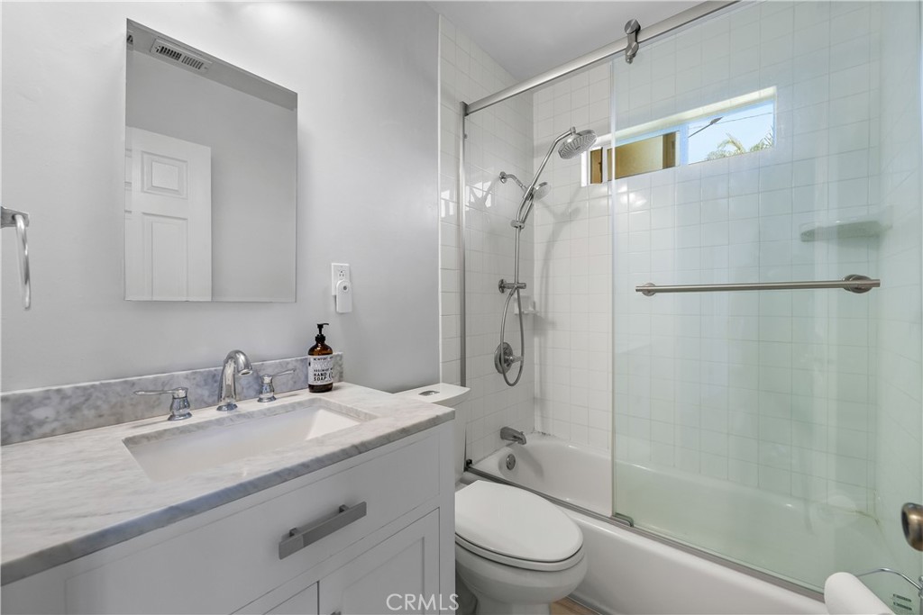 2053 Middlebrook Road Torrance, CA 90501 - Photo 23 of 45 a bathroom with a granite countertop sink toilet and shower