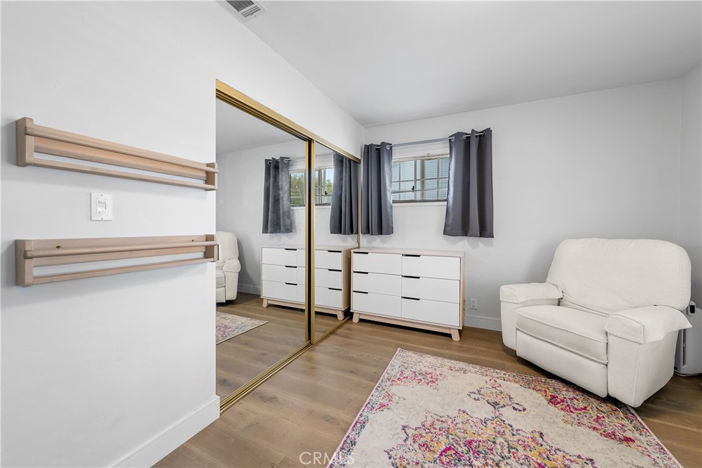 2053 Middlebrook Road Torrance, CA 90501 - Photo 25 of 45 a living room with furniture and a dresser