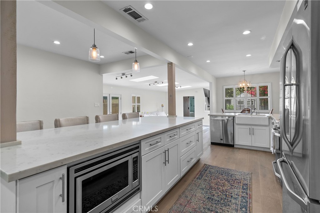 2053 Middlebrook Road Torrance, CA 90501 - Photo 9 of 45 a kitchen with a sink stainless steel appliances and cabinets