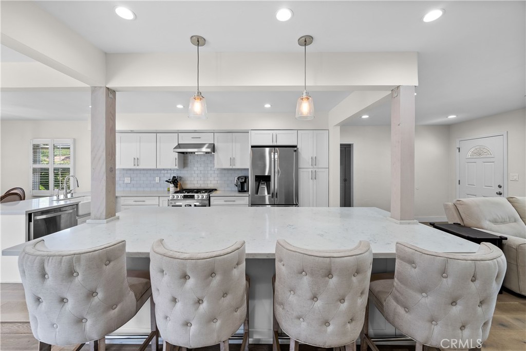 2053 Middlebrook Road Torrance, CA 90501 - Photo 10 of 45 a large kitchen with a table and chairs