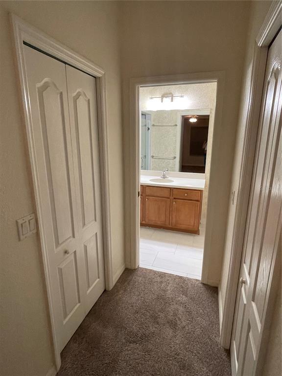 9027 Stone Harbour Loop Bradenton, FL 34212 - Photo 12 of 20 a view of a bathroom with a bathtub and sink