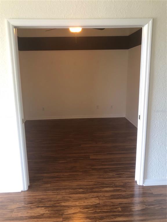 9027 Stone Harbour Loop Bradenton, FL 34212 - Photo 9 of 20 a view of wooden floor