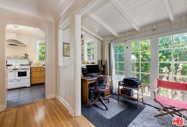 a view of a livingroom with furniture and a rug