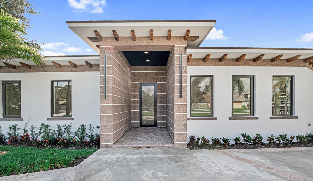 2929 Alice Drive Palm Springs, FL 33461 - Photo 1 of 58 front