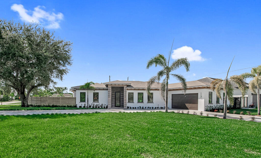 2929 Alice Drive Palm Springs, FL 33461 - Photo 2 of 58 Front