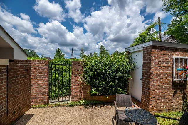 a backyard of a house with lots of green space