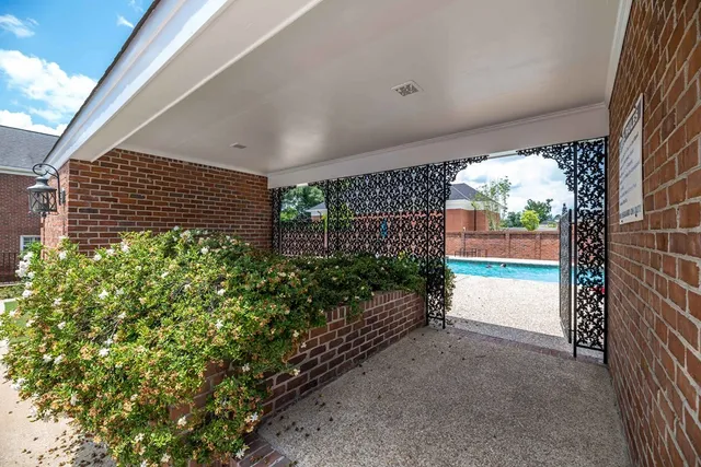 a view of a garden from a balcony