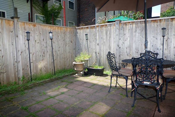 a view of outdoor space with furniture and garden