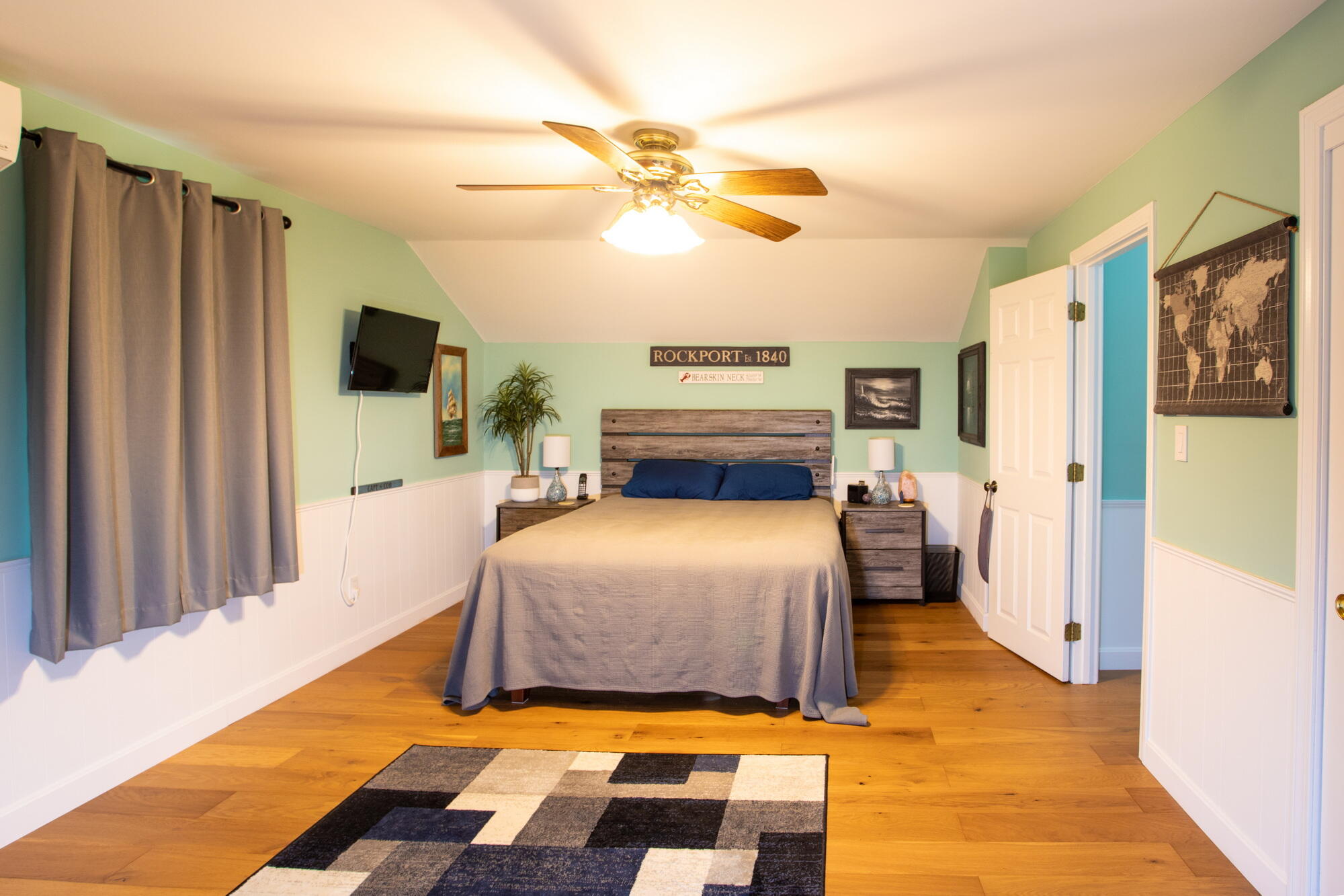 150 Old Mill Road Marstons Mills, MA 02648 - Photo 17 of 29 a bedroom with a bed and a flat tv screen on dresser