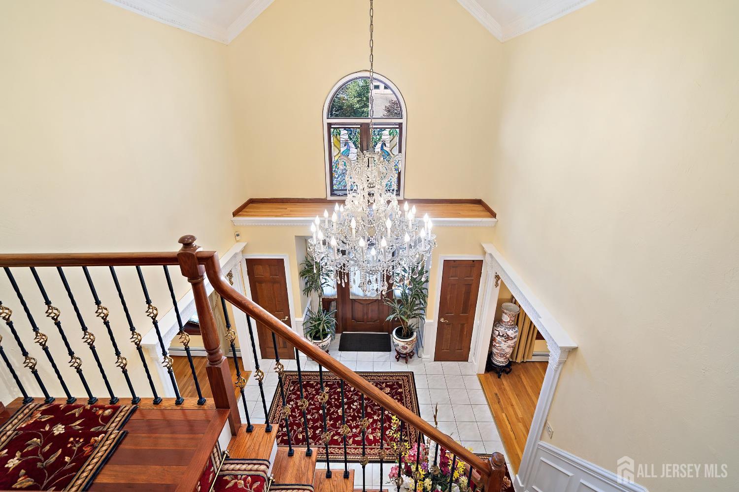 3 Anthony Avenue Edison, NJ 08820 - Photo 19 of 41 a view of a hallway with wooden floor and staircase