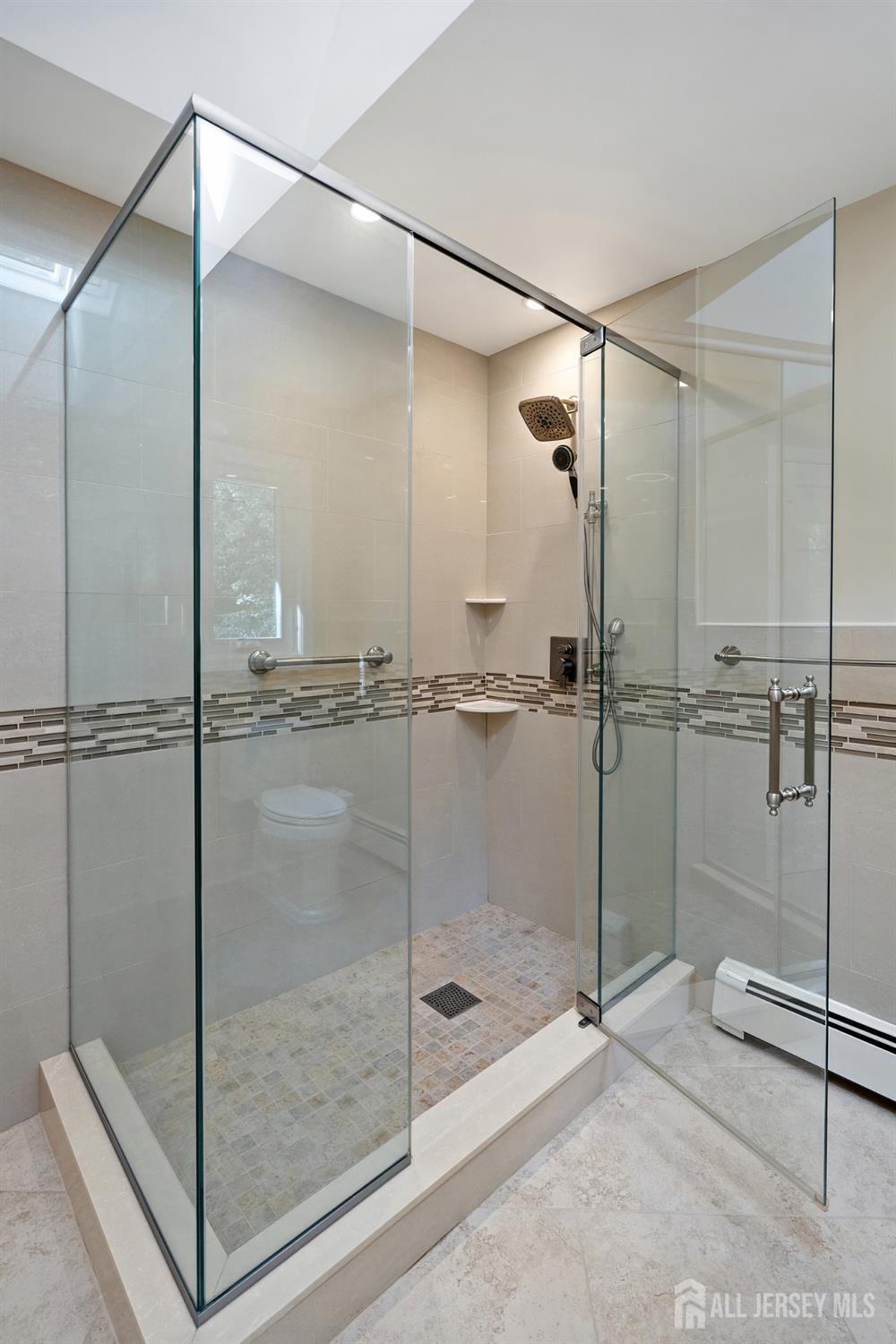 3 Anthony Avenue Edison, NJ 08820 - Photo 28 of 41 a bathroom with a shower