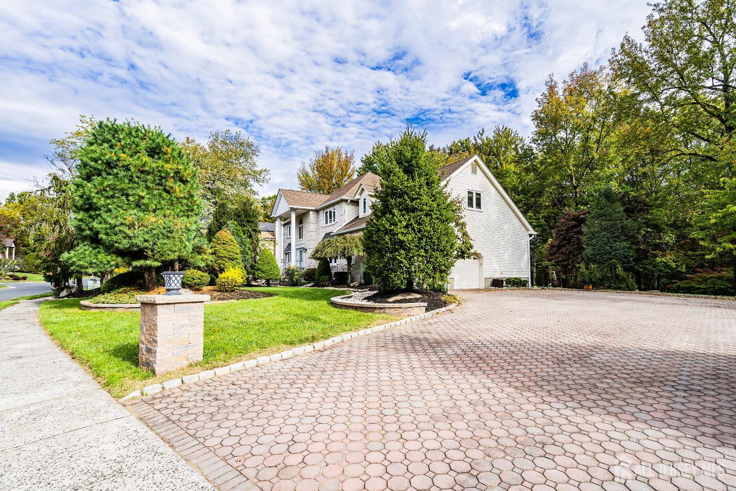 3 Anthony Avenue Edison, NJ 08820 - Photo 5 of 41 a front view of a house with a yard and trees