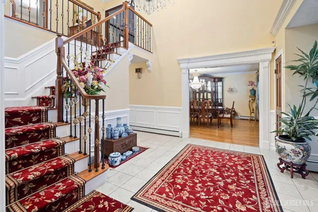 a living room with lots of furniture and a rug