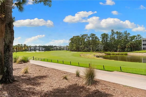 a view of a lake with a big yard