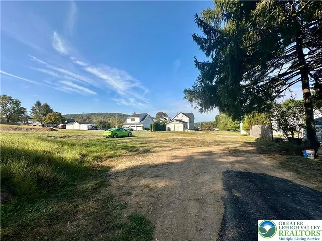 a view of an outdoor space and a yard