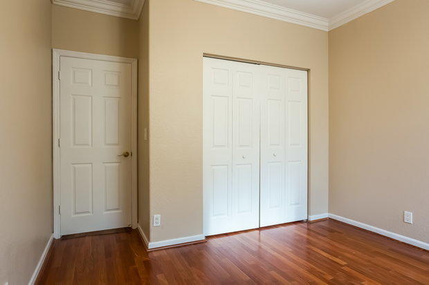 5293 Sancerre Circle Lake Worth, FL 33463 - Photo 14 of 17 a view of an empty room with wooden floor