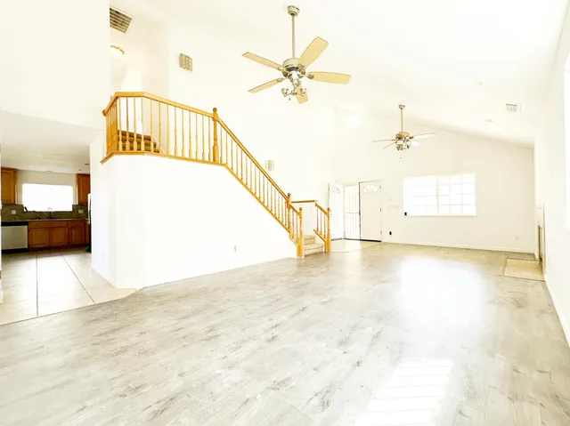 a view of a livingroom with a staircase