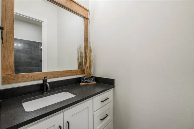 a close view of sink and mirror