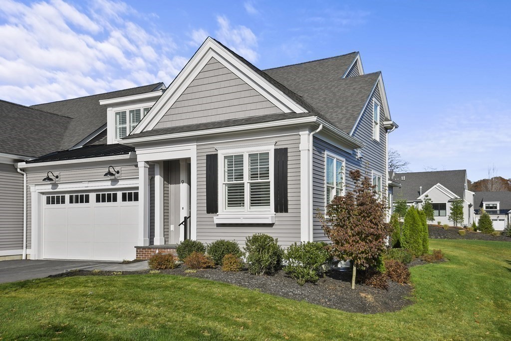 9 Eagle Lane, Unit 9 Framingham, MA 01701 - Photo 1 of 42 front view of a house with a yard
