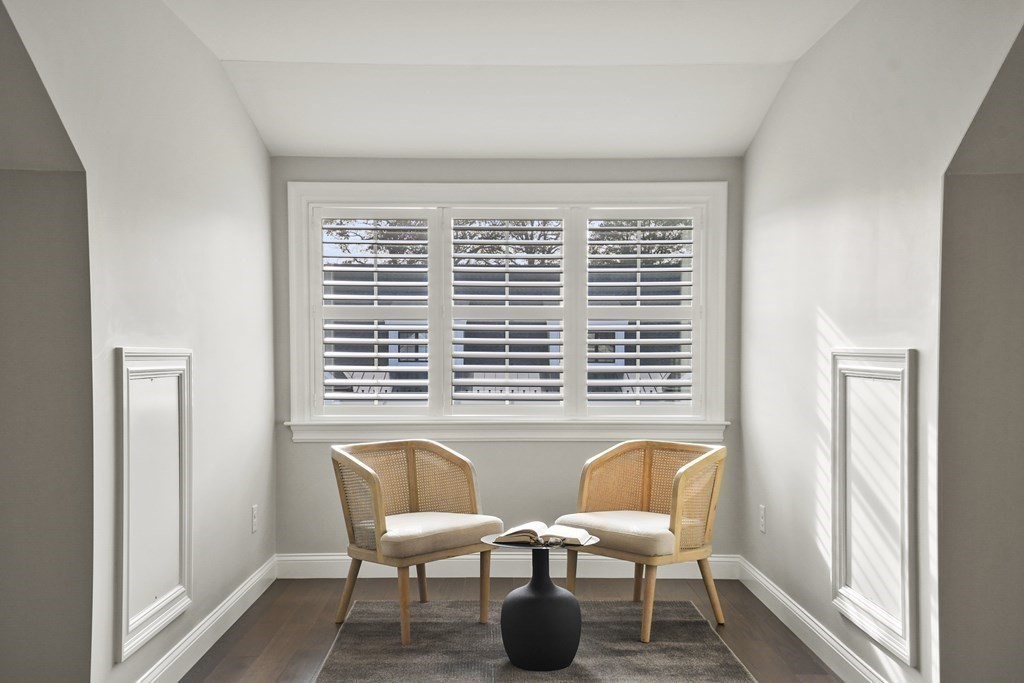 9 Eagle Lane, Unit 9 Framingham, MA 01701 - Photo 26 of 42 a view of a chair and table in a room