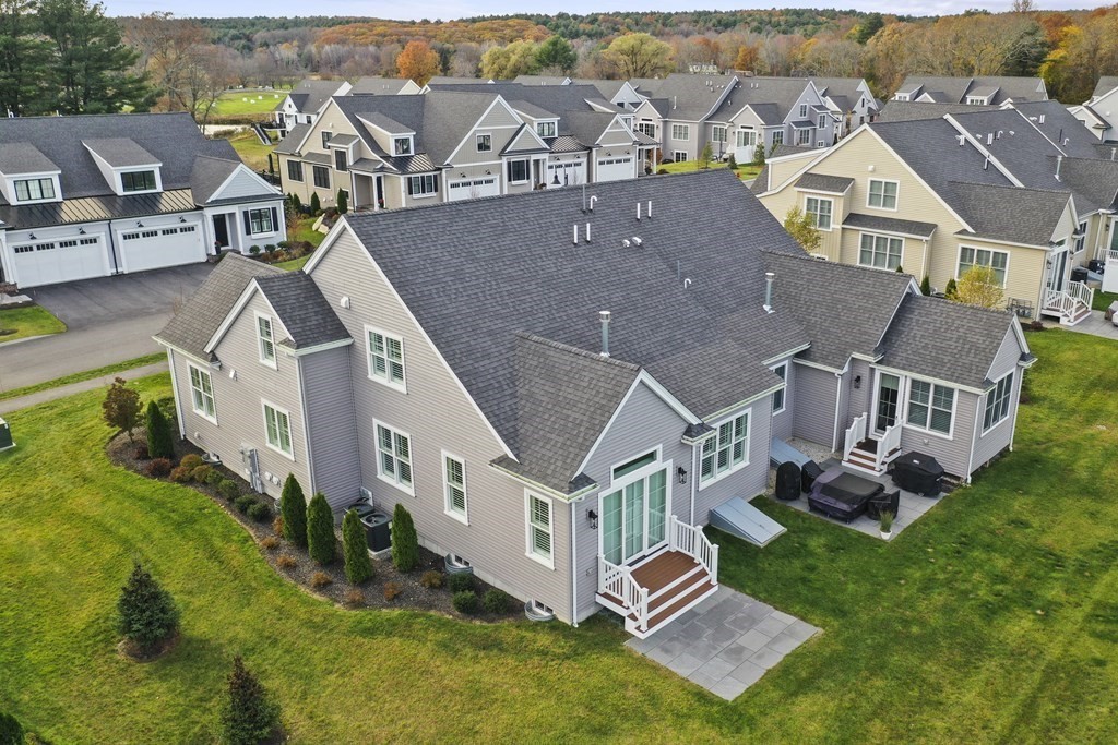 9 Eagle Lane, Unit 9 Framingham, MA 01701 - Photo 32 of 42 an aerial view of a house with a big yard