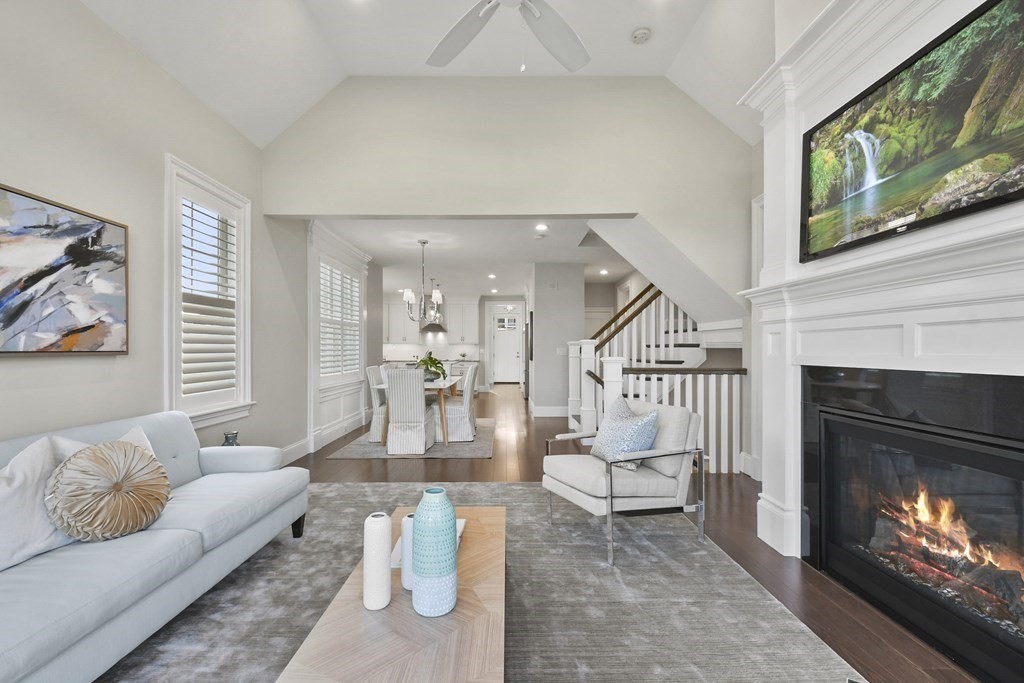 9 Eagle Lane, Unit 9 Framingham, MA 01701 - Photo 10 of 42 a living room with furniture and a fireplace