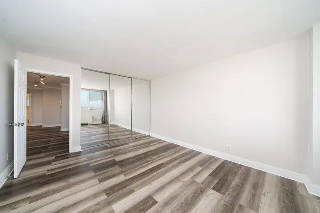 a view of dining room and floor to ceiling window