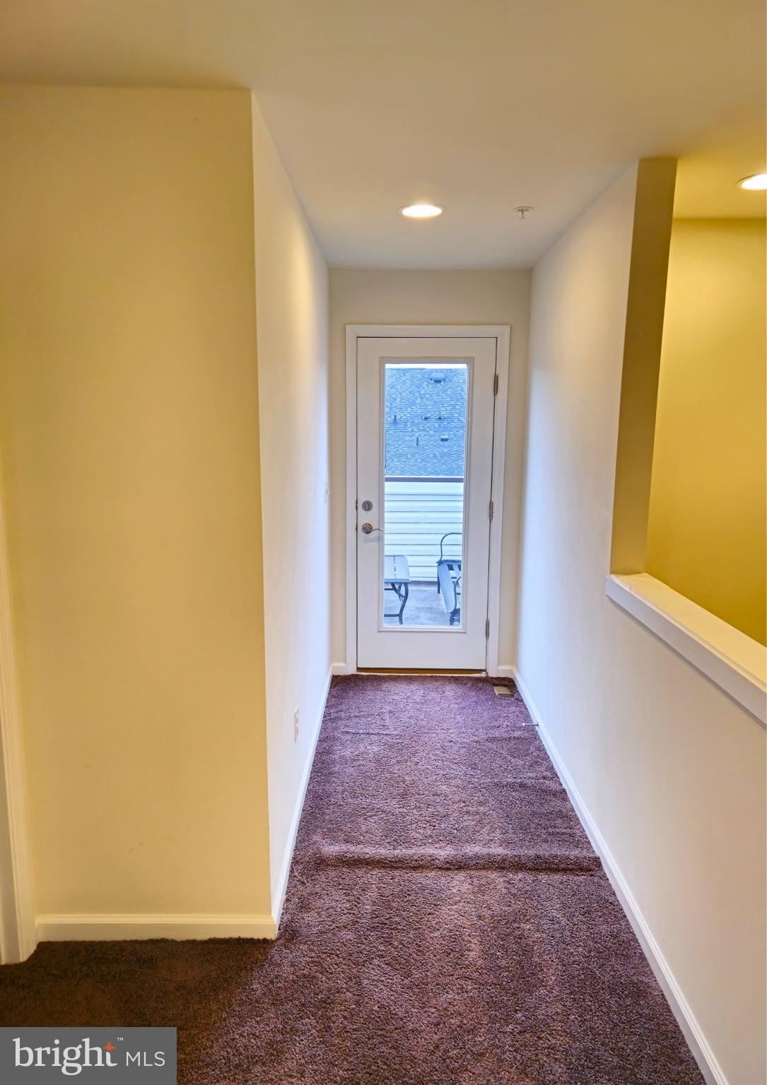 8120 Dalton Way Hanover, MD 21076 - Photo 16 of 22 a view of hallway with wooden floor