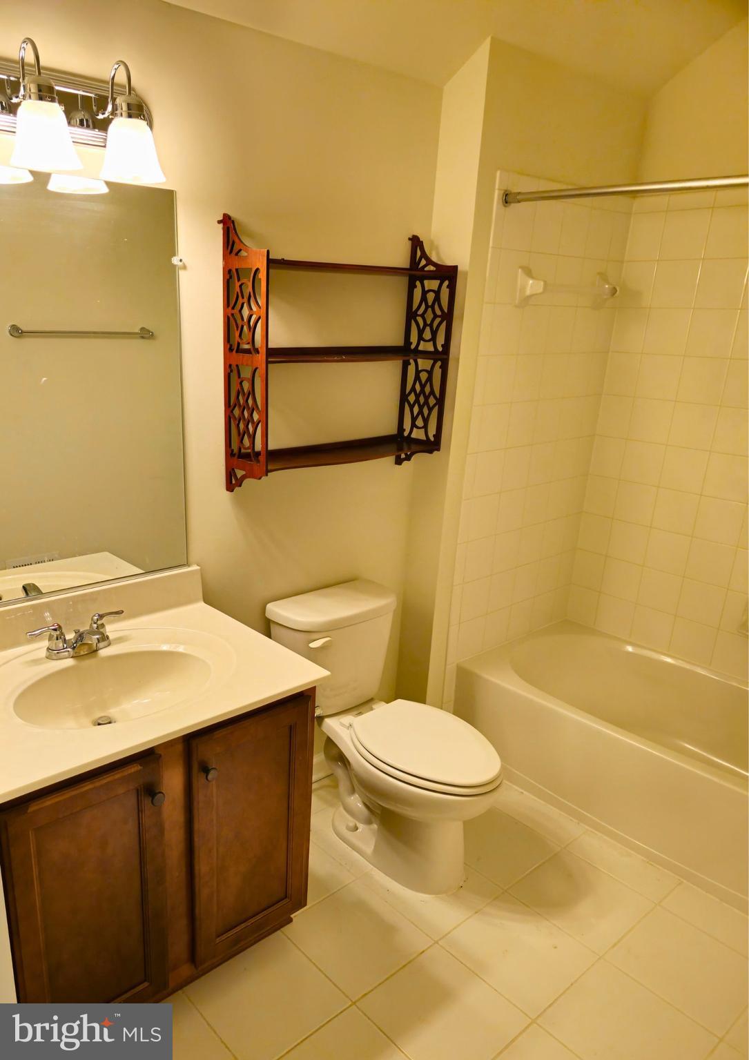 8120 Dalton Way Hanover, MD 21076 - Photo 18 of 22 a bathroom with a sink a toilet and shower