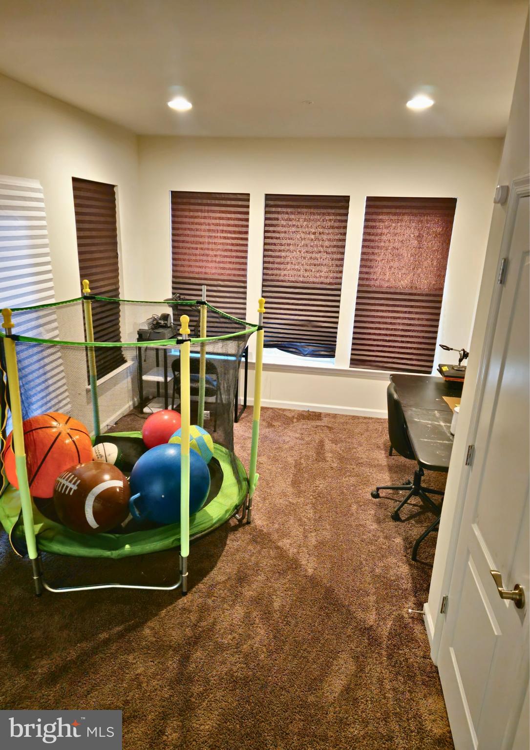 8120 Dalton Way Hanover, MD 21076 - Photo 19 of 22 a living room with furniture and a flat screen tv