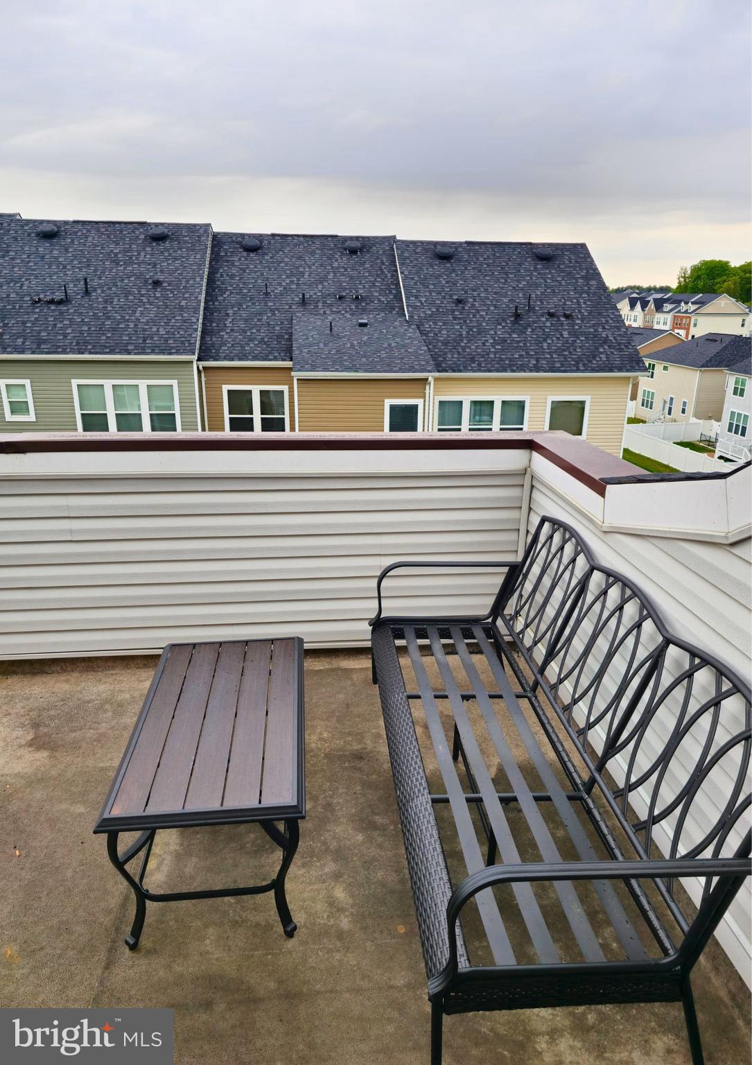 8120 Dalton Way Hanover, MD 21076 - Photo 20 of 22 a view of a patio with wooden floor
