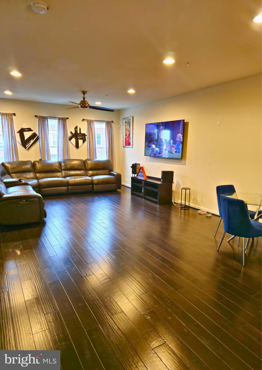 8120 Dalton Way Hanover, MD 21076 - Photo 2 of 22 a living room with furniture and a wooden floor