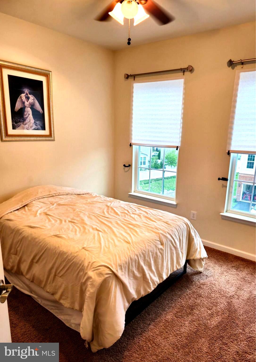 8120 Dalton Way Hanover, MD 21076 - Photo 6 of 22 a bedroom with a bed and a window