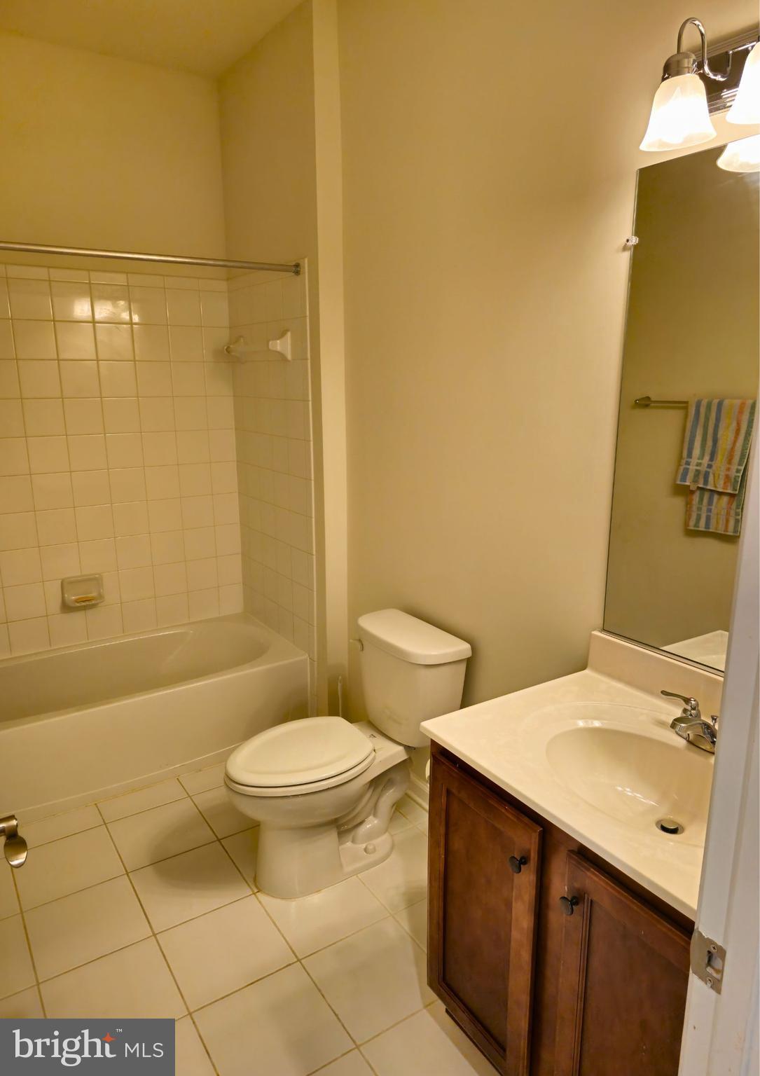 8120 Dalton Way Hanover, MD 21076 - Photo 8 of 22 a bathroom with a sink a toilet and shower