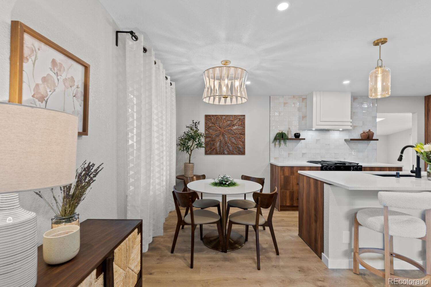 1711 South Forest Street Denver, CO 80222 - Photo 11 of 44 a view of a dining room with furniture window and outside view