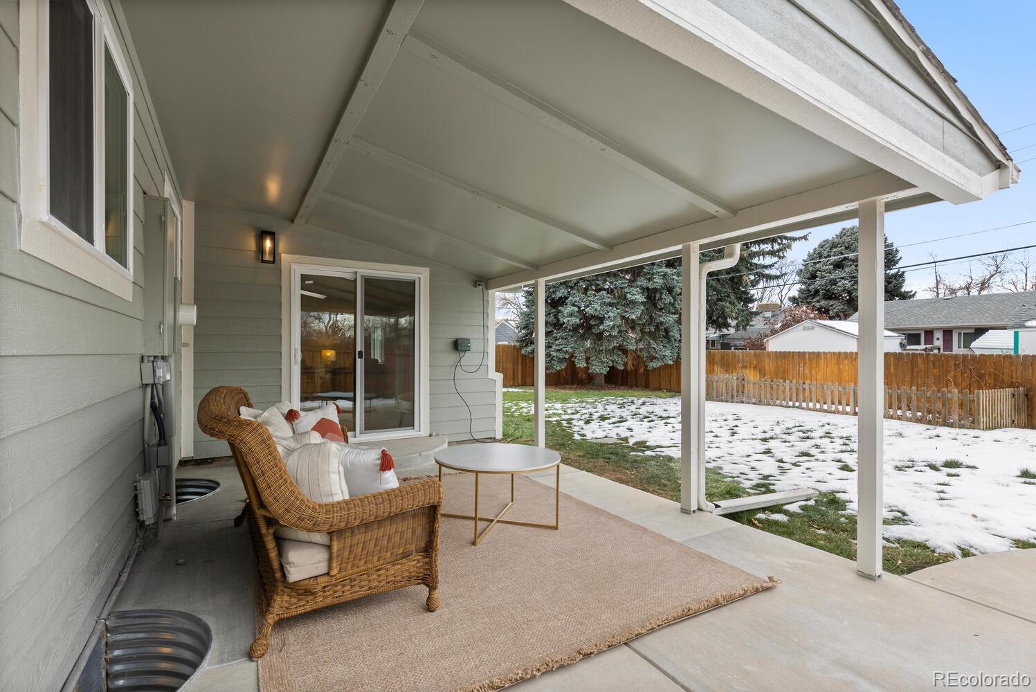 1711 South Forest Street Denver, CO 80222 - Photo 35 of 44 a building outdoor space with patio furniture and potted plants