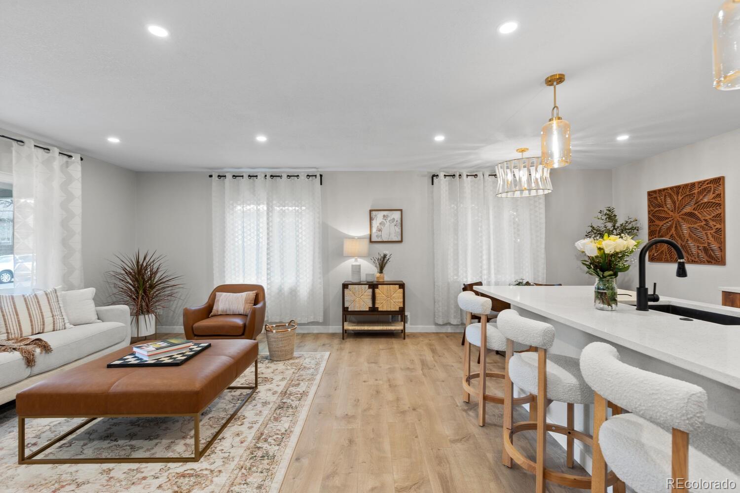 1711 South Forest Street Denver, CO 80222 - Photo 9 of 44 a living room with furniture and wooden floor
