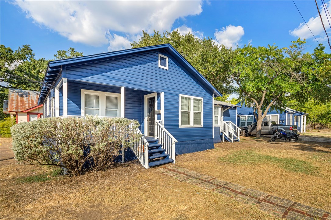 a view of a house with a patio