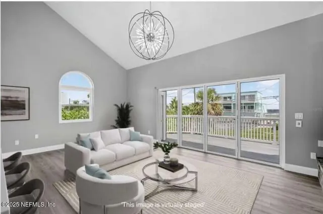 a view of a balcony with wooden floor