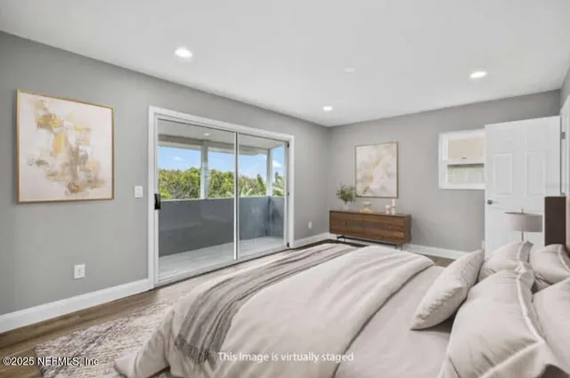 a bathroom with a sink a toilet and window