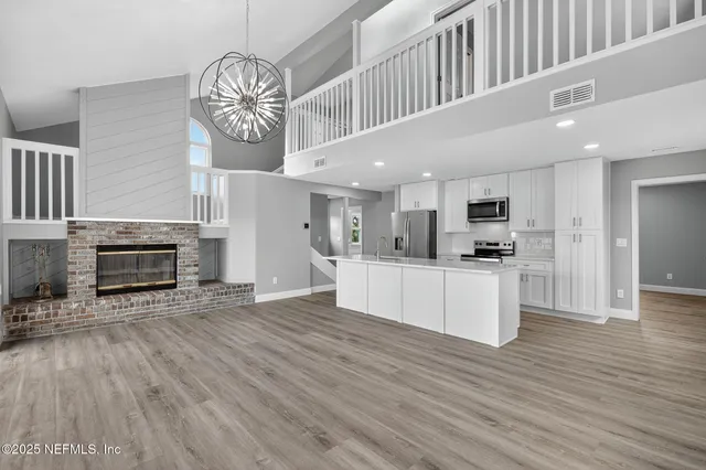 a kitchen with a sink and a window