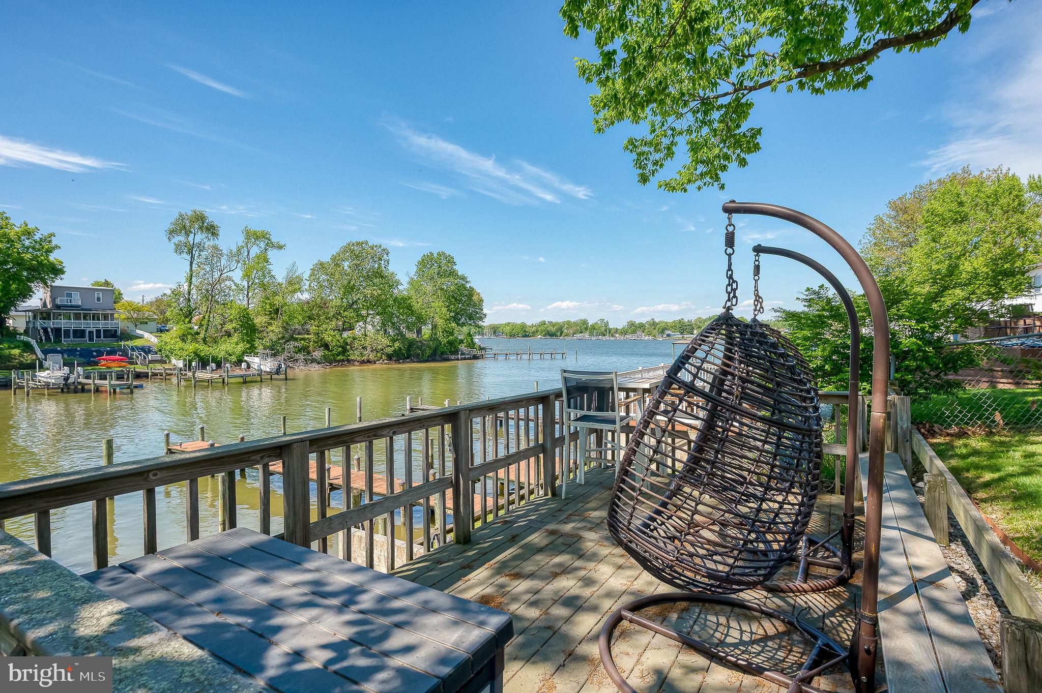 2222 Monocacy Road Essex, MD 21221 - Photo 43 of 70 Serene lakeside retreat with swing.