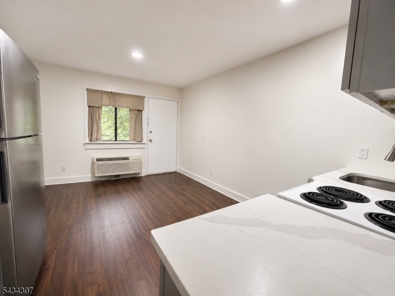 207 Old Chimney Ridge Road, Unit L Montague, NJ 07827 - Photo 6 of 14 a bedroom with a bed and a window