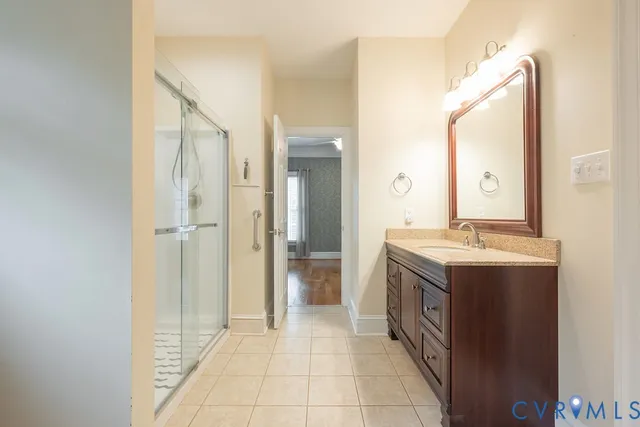 a bathroom with a toilet and shower
