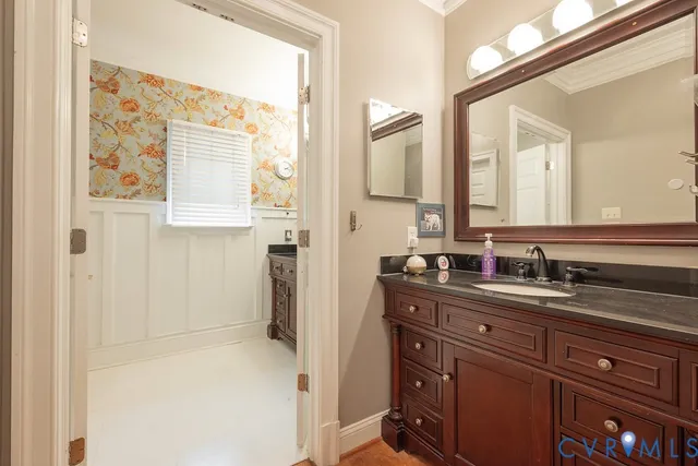 a view of a swimming pool and lounge chairs