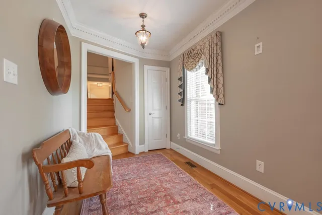 an aerial view of a house with a yard basket ball court and outdoor seating