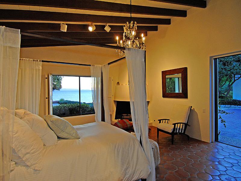 4347 Marina Drive Santa Barbara, CA 93110 - Photo 6 of 11 a bed sitting in a bedroom next to a window